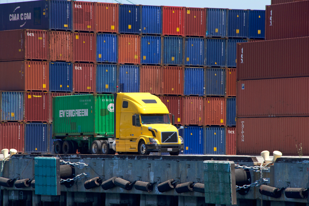 Evergreen container hooked to truck