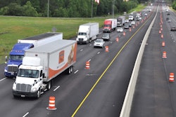 trucks and cars on highway