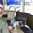 office behind computer screens checking truck weight