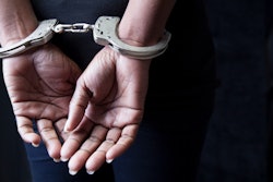 Person in handcuffs