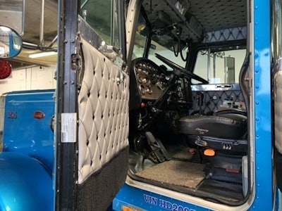 Interior view of Goldman's rig, from the driver side