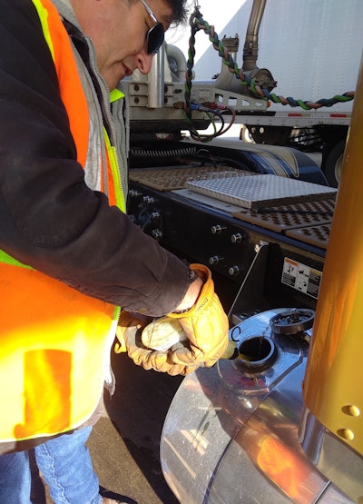 John McCormick adding fuel treatment