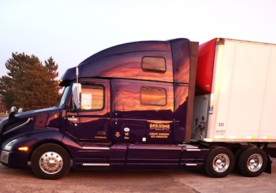 Schmidt's 2018 volvo truck hooked to a dry van trailer