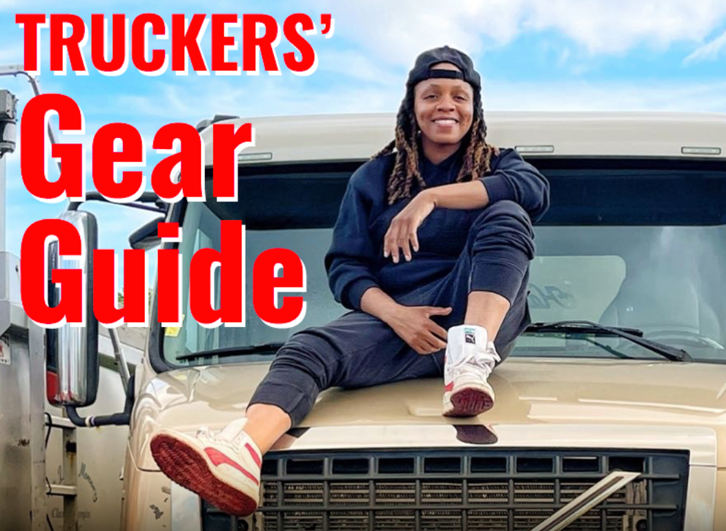 Woman sitting on the hood of her truck