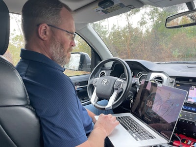 Counting on connectivity. SureCall's Fusion2Go OTR cell phone signal booster increased reception during testing in rural Northwest Florida. CCJ senior editor Tom Quimby is shown above testing his mobile hot spot.