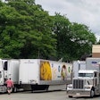 Semi-trucks delivering groceries to a store