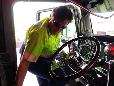 John McCormick climbing into the truck
