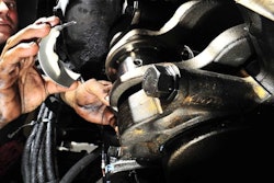 mechanic working on engine