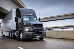 Mack Anthem drives over a bridge