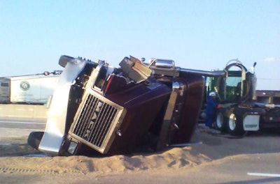 Tim Pulli's Mack tipped over after crash in 2012