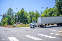 truck waiting at a stop light