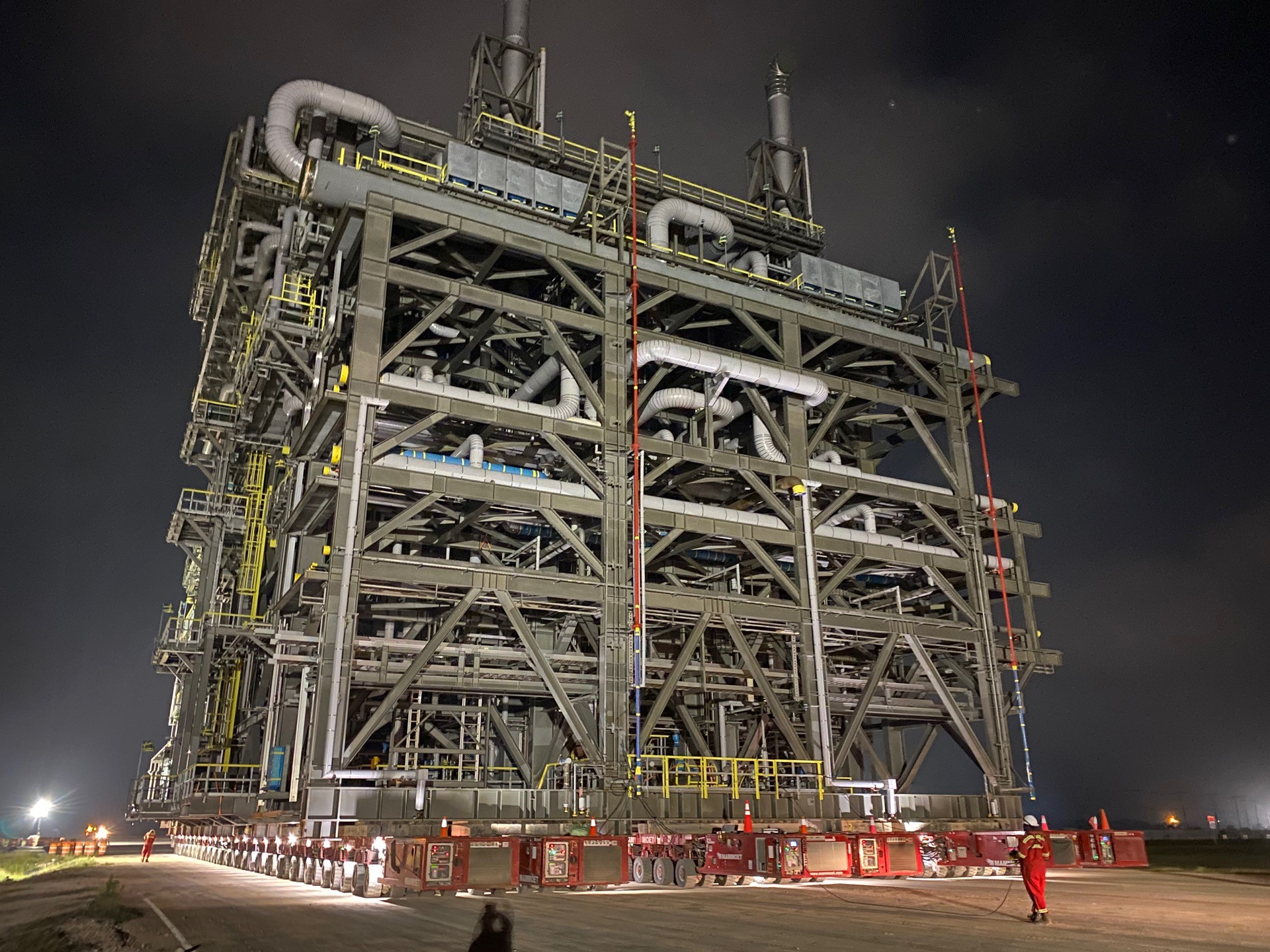 250' tall, 190' long and 150' wide. These on-shore furnaces are 'some of the biggest things to be moved this far' on land, said Mammoet's team lead on this five-mile move from the coast inland to a pastics facility in Texas.