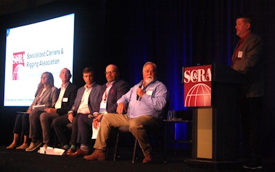 Panel on stage at SCRA Specialized Transportation Symposium