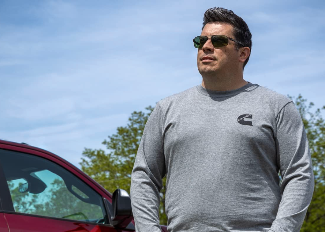 Man wearing Cummins logo long-sleeved T