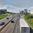 view of cars and trucks from overpass