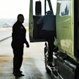 truck inspector, driver exiting cab
