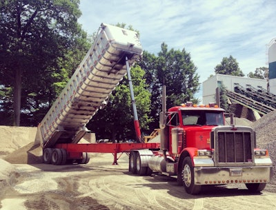 One of Connecticut-based fleet owner Dave Palumbo's trucks on a job site. Palumbo says Connecticut's new tax will cost $150,000 this year and he had to hire help to deal with the 'very, very confusing' details.