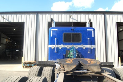 Cap trucking 2019 pete outside JT Carriers' shop