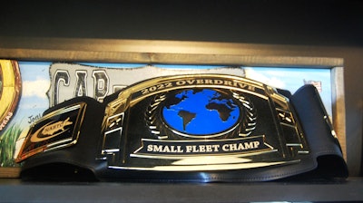 Small Fleet Champ title belt in CAP Trucking office