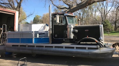 View from the side of Peterbilt pontoon boat