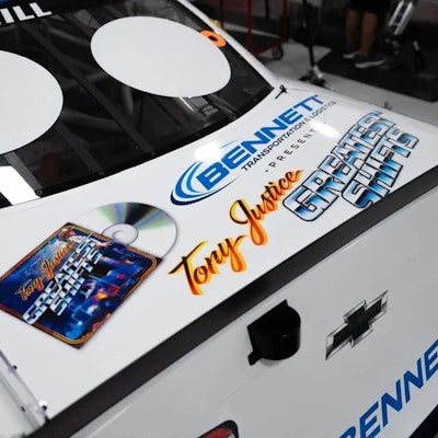 Tony Justice 'Greatest Shifts' album art on the back of 21 Austin Hill Car