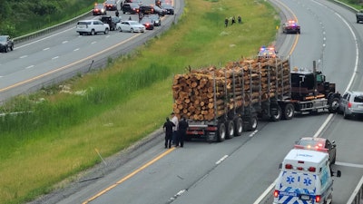 logging truck stopping suv on i-88 new york