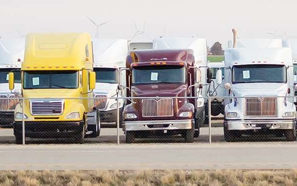 semis in a parking lot