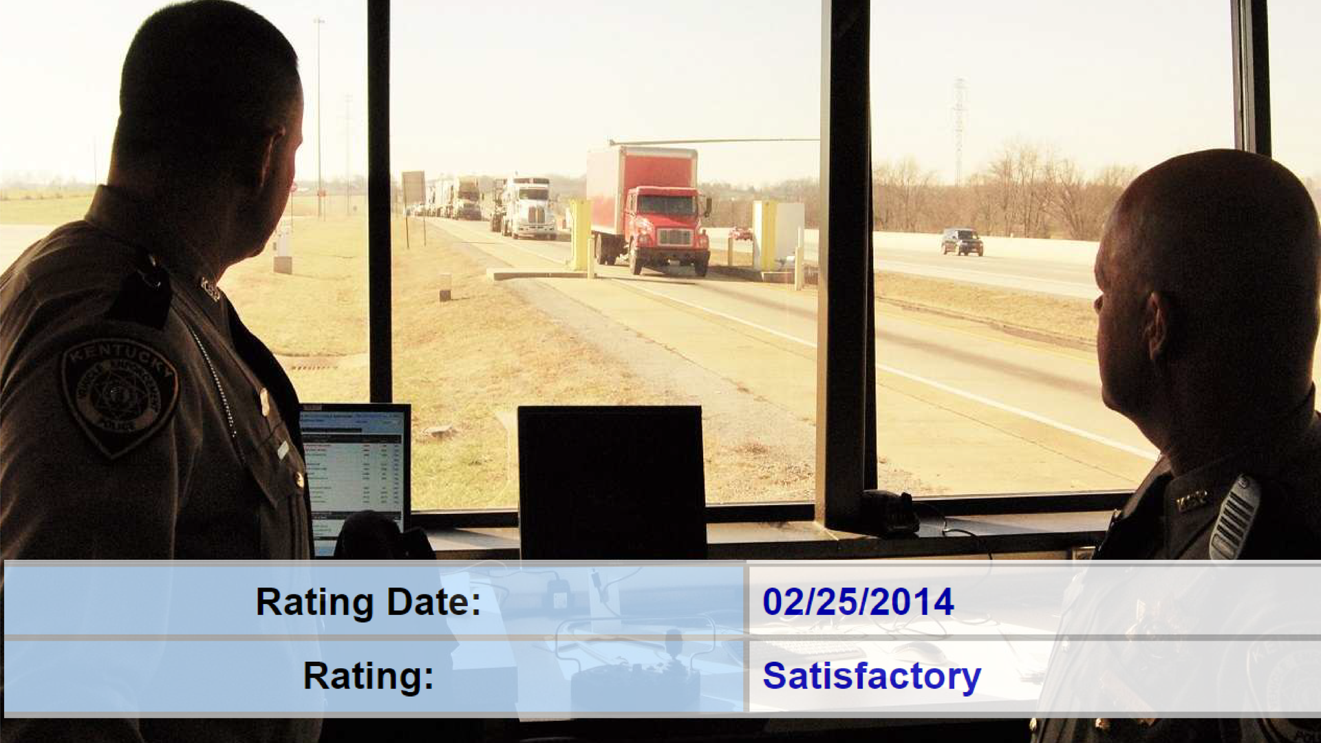 Inspectors watching trucks roll into a weigh station