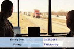 Inspectors watching trucks roll into a weigh station