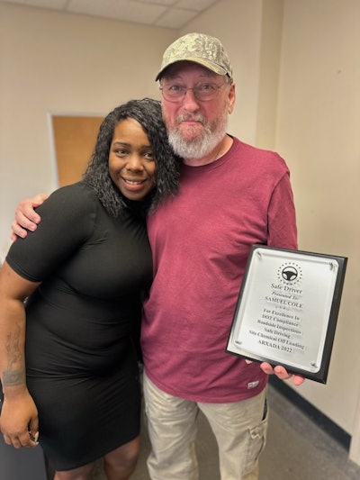 Dad was named the 2022 Safe Driver of the Year by Arxada Wood Protection -- his last full year as a driver. He's shown here accepting the award from Ariel Foster, transportation coordinator at Arxada.