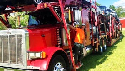 Crystal Rives and her 2006 Peterbilt 379 and Cottrell trailer