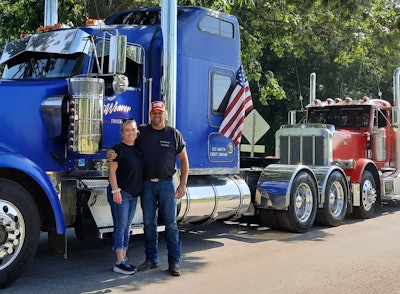 Lisa Turley and Dannel Weaver with Truck No. 2 in the fleet on-site during the Fredericksburg, Ohio, July 4 parade.