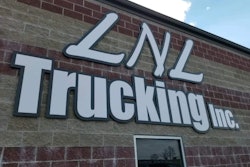 LNL Trucking logo on building