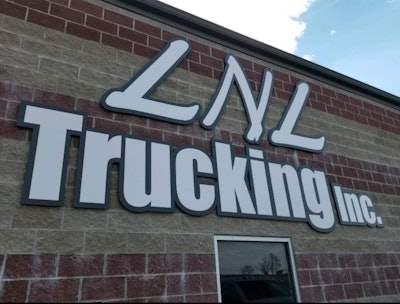 LNL Trucking logo on building