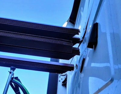 Angle iron load shifted into back of truck cab automatic emergency braking