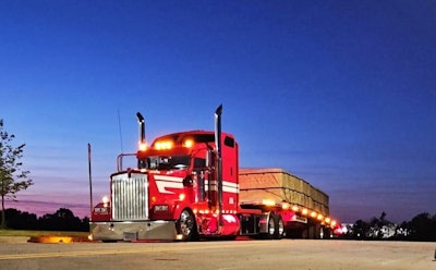 K&D Transport's 2003 Kenworth W900, at night