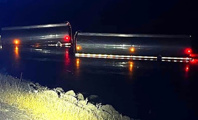 Two separate incidents separated by mere hours put two different doubles-hauling rigs, including the tankers shown, into the Columbia River Friday night. Both incidents occurred on the relatively short section between the Sam Hill Memorial Bridge and Miller Island.
