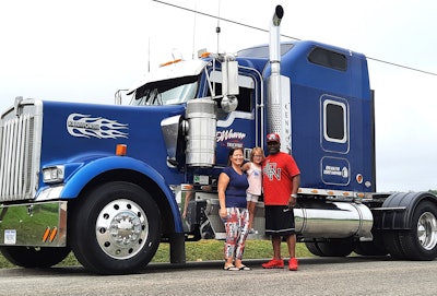 This team includes Tony Owens (pictured) and his family, shown with the No. 5 D. Weaver Trucking Truck in the 2023 Fredericksburg July 4th Parade.