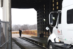 truck entering inspection barn