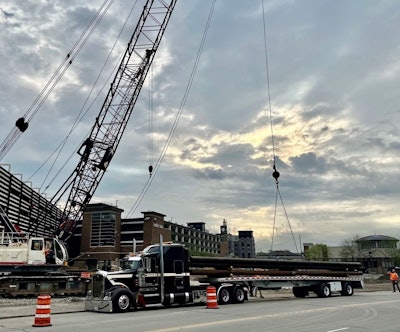 K&D tractor on-site in-city for unload of beams
