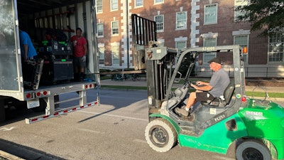 Gerry Glass unloading trailer