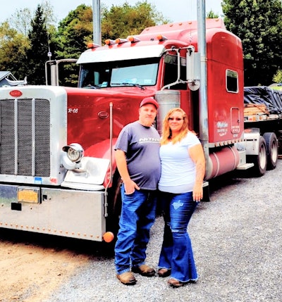 Chelsie and Robert Reynolds, and his 2008 Peterbilt 389.