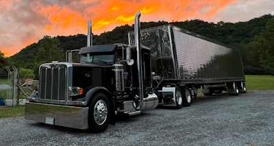 This 2011 Peterbilt 389 glider was named the winner in the 2022 Overdrive's Pride & Polish competition in the Working Combo, 2011 & Older category. It's driven by Harold 'Bud' Smith and owned by Michael Scherkenbach, owner of Denver-based Shomotion.
