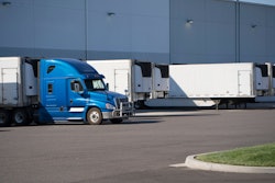 truck and reefer trailers at dock