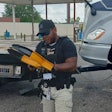 An armed A1's Towing & Hauling agent tows a truck from A Valero station in Memphis, even though the operator was on-site.