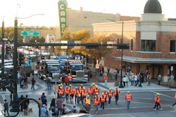 A veritable army of volunteers in safety vests fanned out at the parade's start through the throngs on-hand to help with donations to the United Way of Denton.