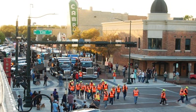 A veritable army of volunteers in safety vests fanned out at the parade's start through the throngs on-hand to help with donations to the United Way of Denton.