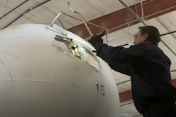 NTSB investigator inspecting anhydrous ammonia tanker