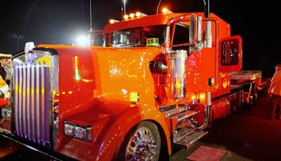 K&D Transport's 2003 Kenworth W900L at night