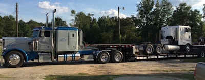 C.J. Donovan's 1984 Peterbilt 359 pulling his 1984 Peterbilt 362